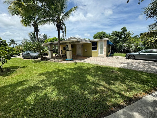 exterior space featuring a lawn