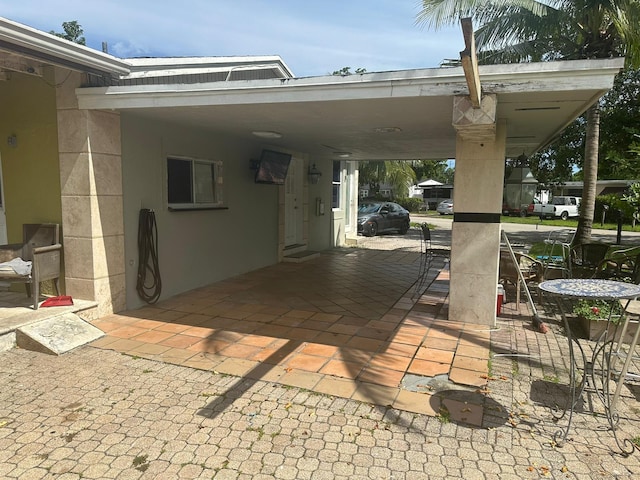 view of patio with a carport