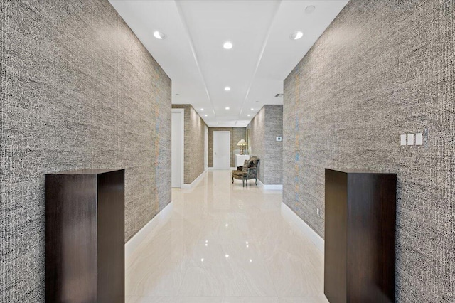 hallway with tile walls