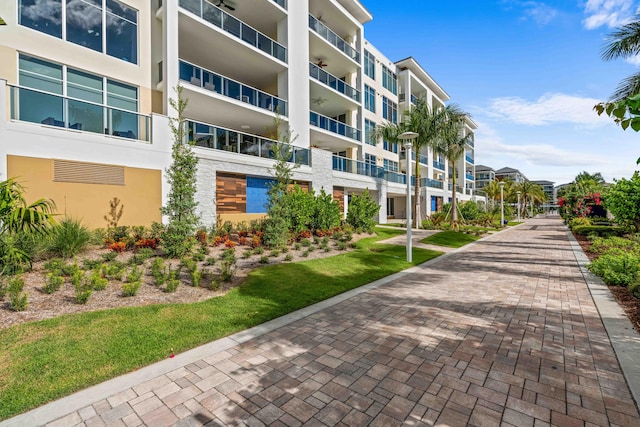 view of home's community with a lawn