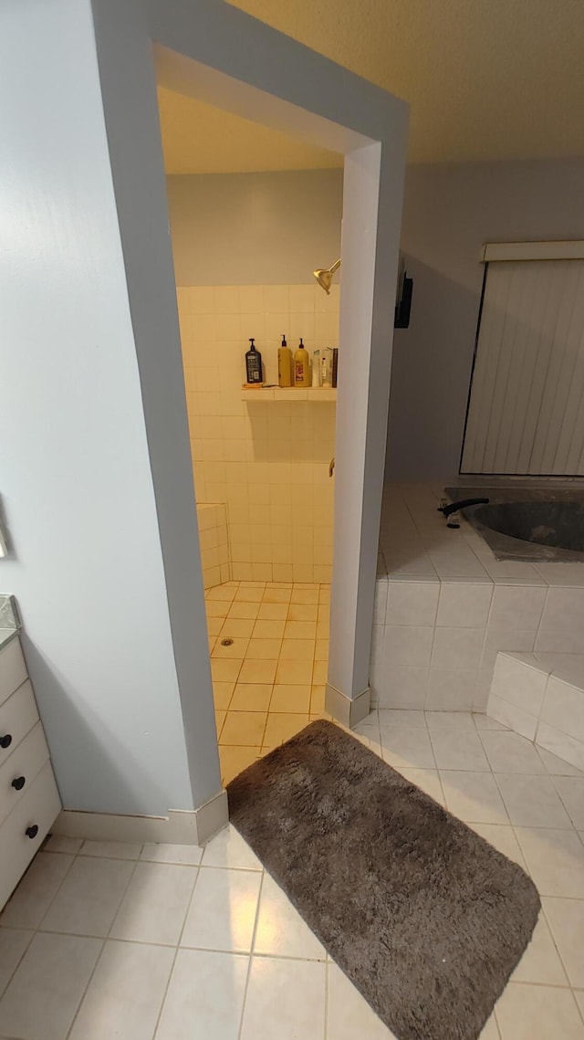 bathroom with tile patterned flooring