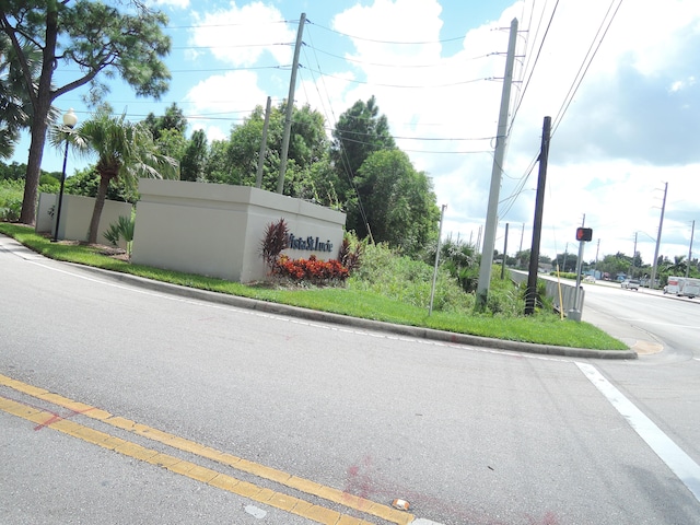 view of side of home with a lawn