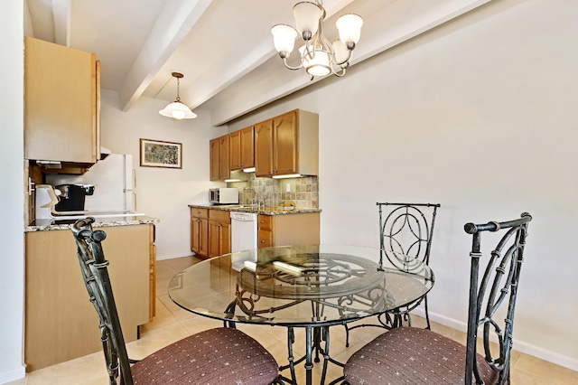 tiled dining space with beam ceiling, sink, and a chandelier