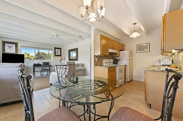 dining space featuring ceiling fan with notable chandelier, light tile patterned floors, sink, and beamed ceiling