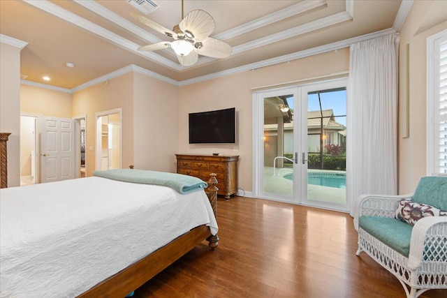 bedroom with access to outside, hardwood / wood-style floors, crown molding, ceiling fan, and french doors