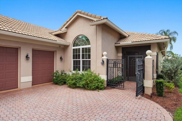 property entrance featuring a garage