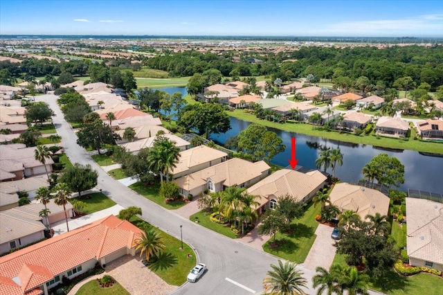 birds eye view of property featuring a water view