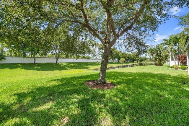 view of yard featuring a water view