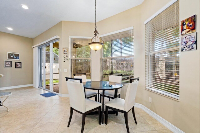 dining room featuring light tile patterned floors