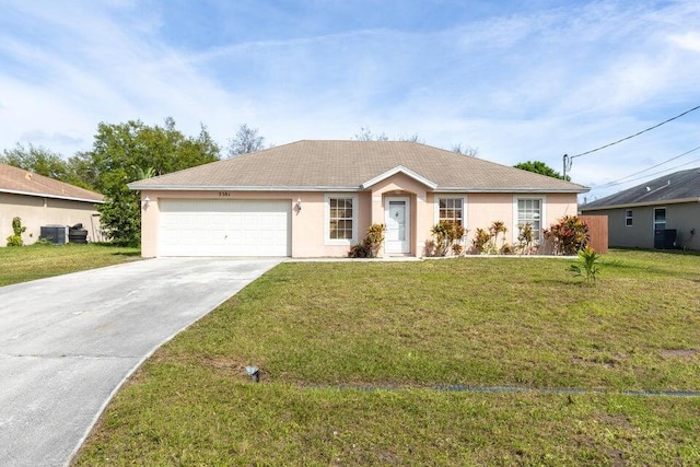 single story home with a front yard and a garage