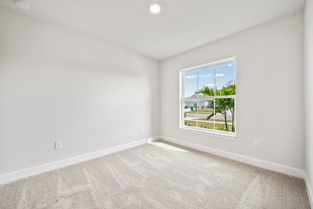 spare room with carpet flooring