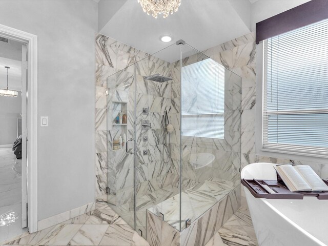 bathroom with a wealth of natural light, plus walk in shower, and tile walls