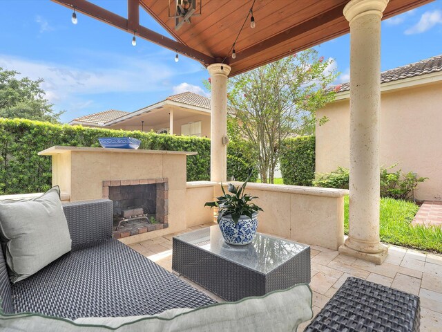 view of patio / terrace with a tile fireplace