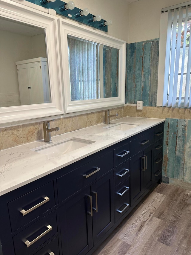 bathroom featuring wood-type flooring and vanity