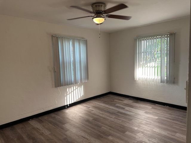 unfurnished room featuring light hardwood / wood-style floors and ceiling fan