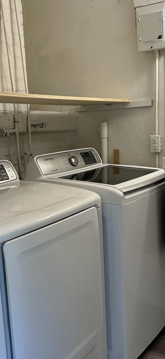 laundry area featuring washing machine and dryer