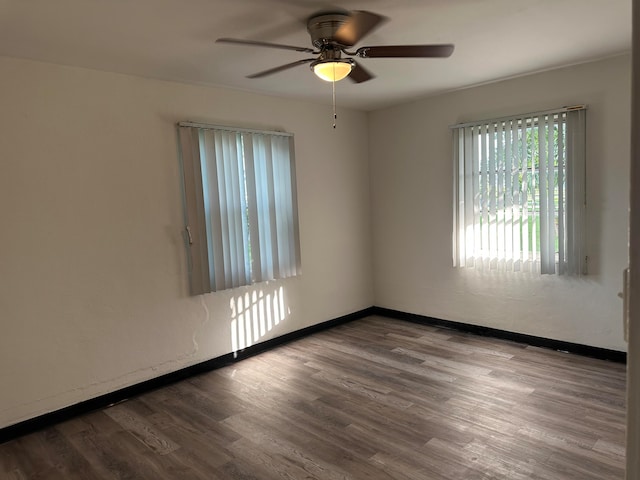 unfurnished room featuring ceiling fan and light hardwood / wood-style flooring