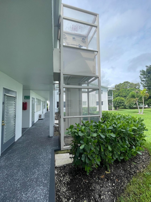 entrance to property with a patio area