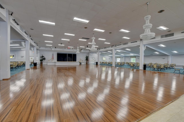 exercise area featuring light hardwood / wood-style floors