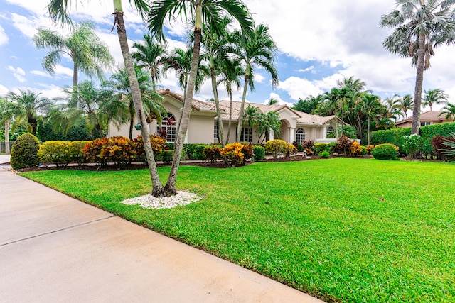 view of front of home with a front yard