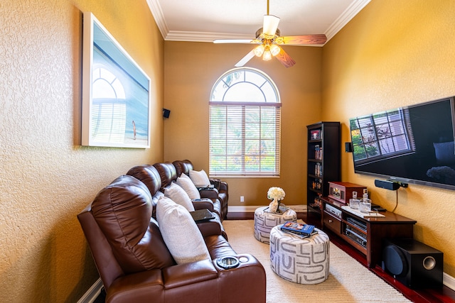 living room featuring ceiling fan and ornamental molding