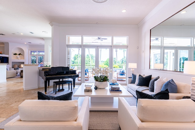 living room with a textured ceiling, ornamental molding, ceiling fan, french doors, and built in features