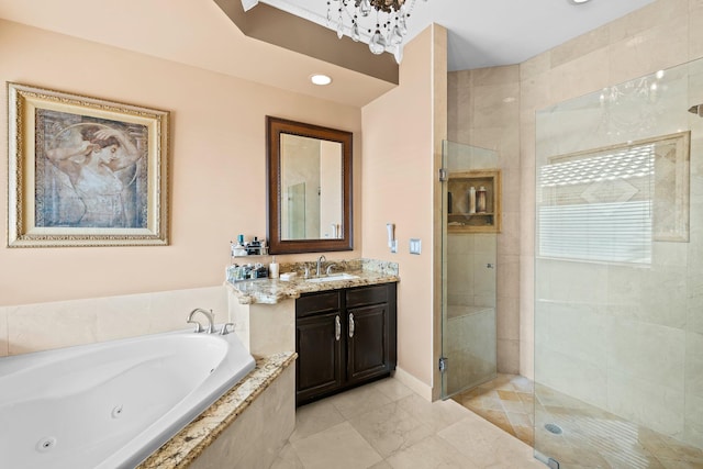 bathroom with shower with separate bathtub and vanity