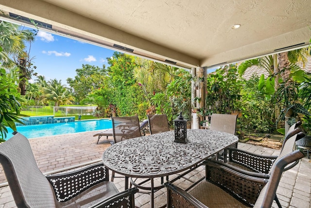 view of patio / terrace with pool water feature