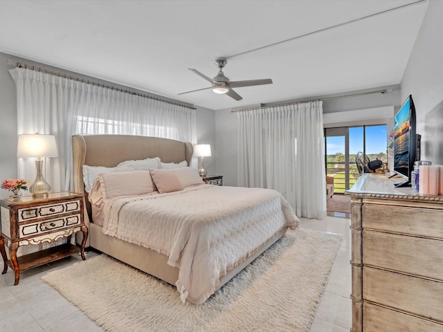 bedroom with ceiling fan, access to exterior, and light tile patterned floors