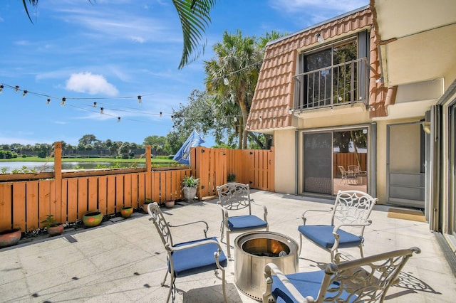 view of patio / terrace featuring a water view