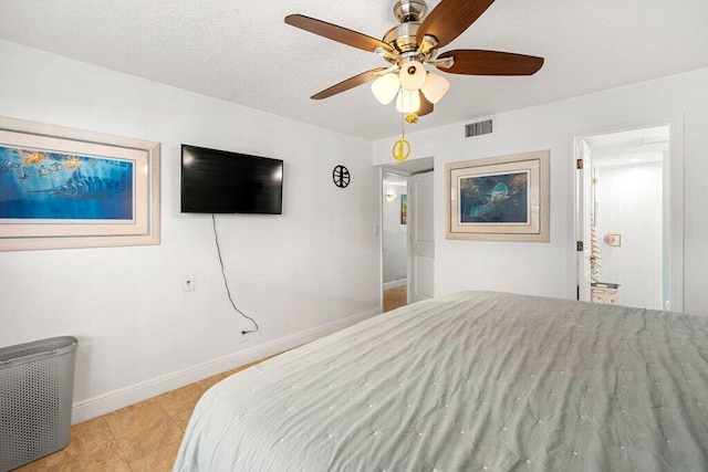 bedroom with ceiling fan, a textured ceiling, and light tile patterned floors