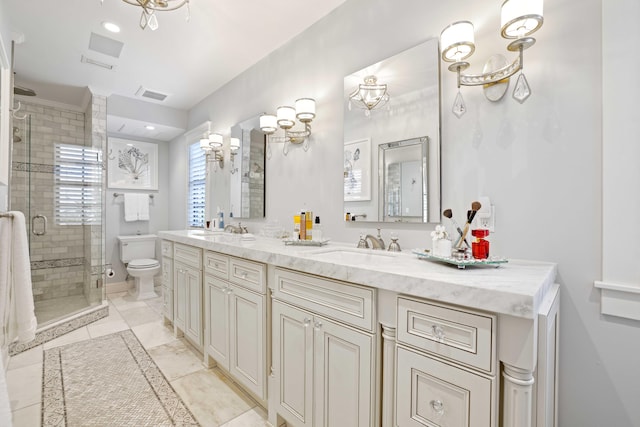 bathroom with walk in shower, vanity, and toilet