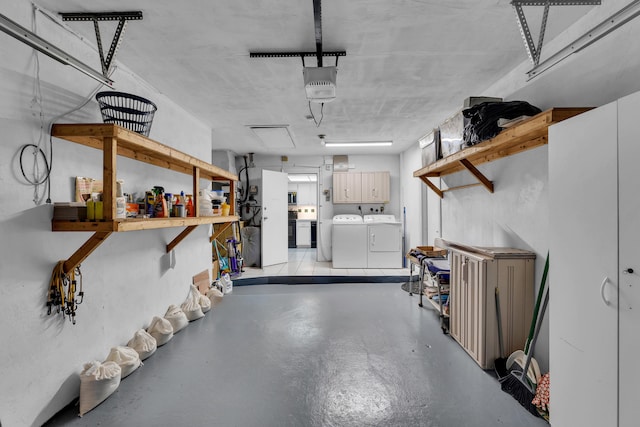 garage featuring washer and dryer