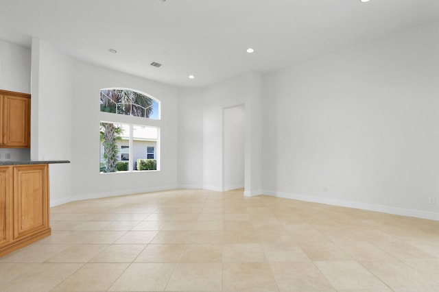 view of tiled spare room