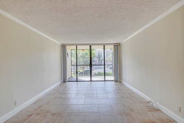 unfurnished room with crown molding, light tile patterned flooring, and floor to ceiling windows