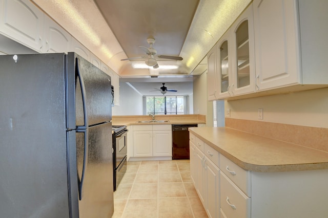 kitchen with ceiling fan, white cabinets, light tile patterned floors, sink, and black appliances