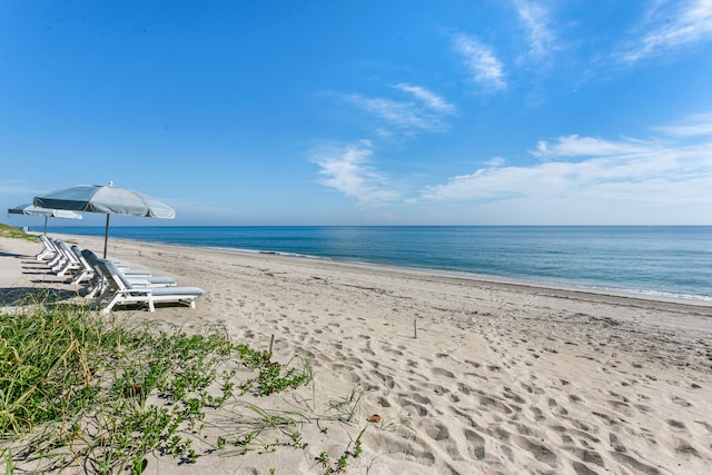 property view of water featuring a beach view