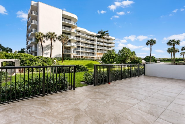 view of patio featuring a balcony