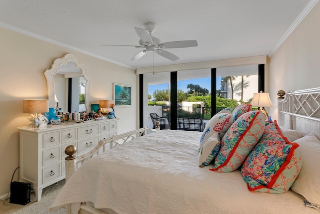 carpeted bedroom featuring ornamental molding, access to outside, and ceiling fan