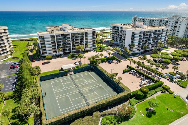 aerial view featuring a water view and a beach view