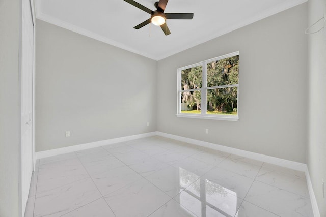 spare room featuring ceiling fan and crown molding