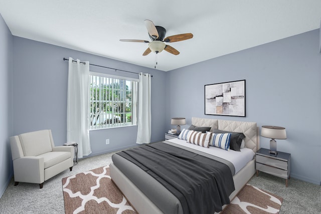 bedroom with ceiling fan and carpet floors