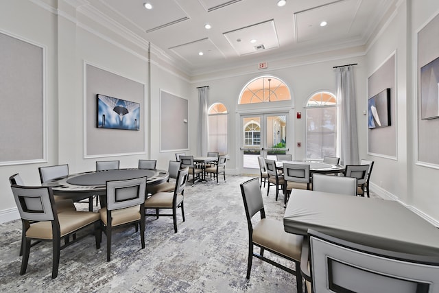 dining area featuring beam ceiling, ornamental molding, french doors, and coffered ceiling