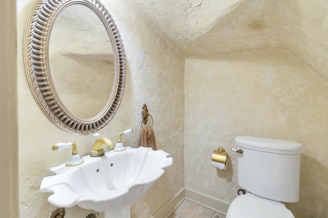 bathroom with sink and toilet