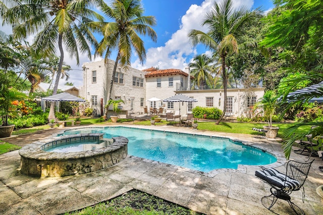 view of pool with a gazebo, an in ground hot tub, and a patio area