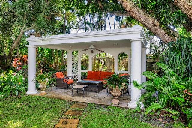 view of patio / terrace featuring ceiling fan and an outdoor living space