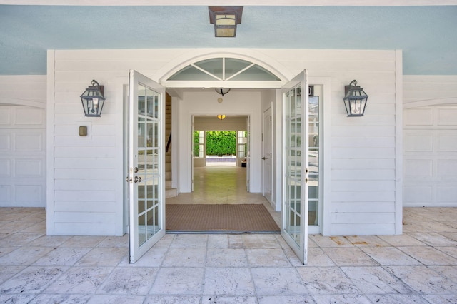 doorway to property featuring a garage