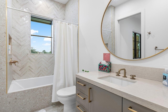 bathroom with vanity, toilet, and an enclosed shower