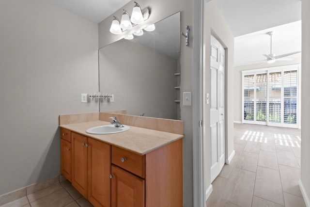 bathroom with vanity, tile patterned floors, and ceiling fan