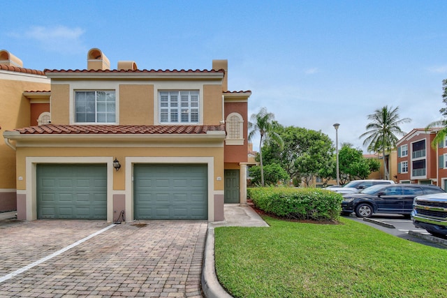 view of front of house with a garage